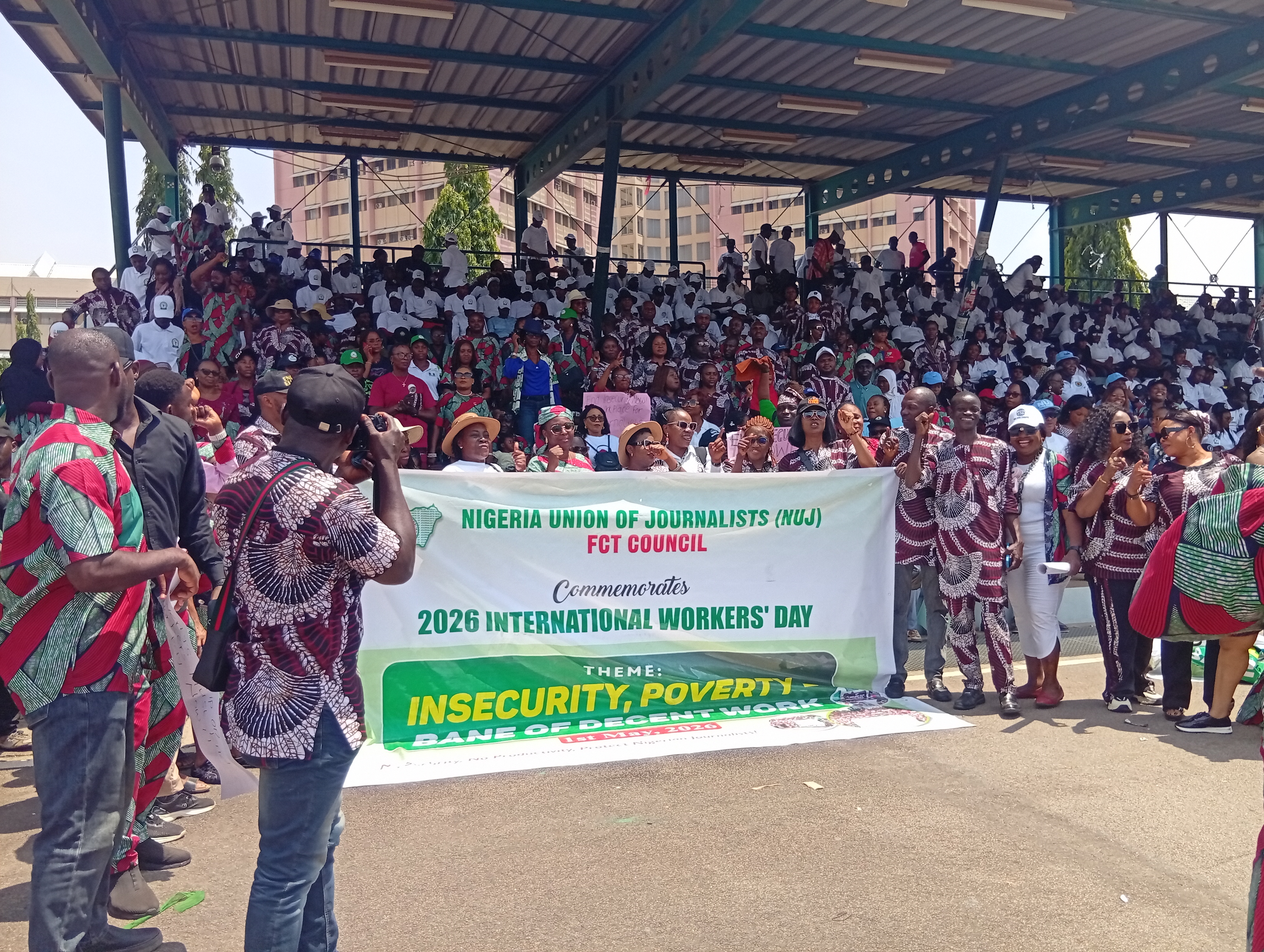Members of the Nigeria Union of Journalists (NUJ) during the May Day march past at Eagle Square, Abuja